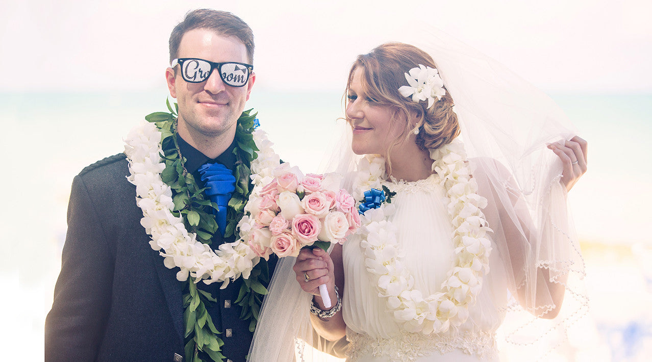 A Bride and Groom laugh and joke in Maui